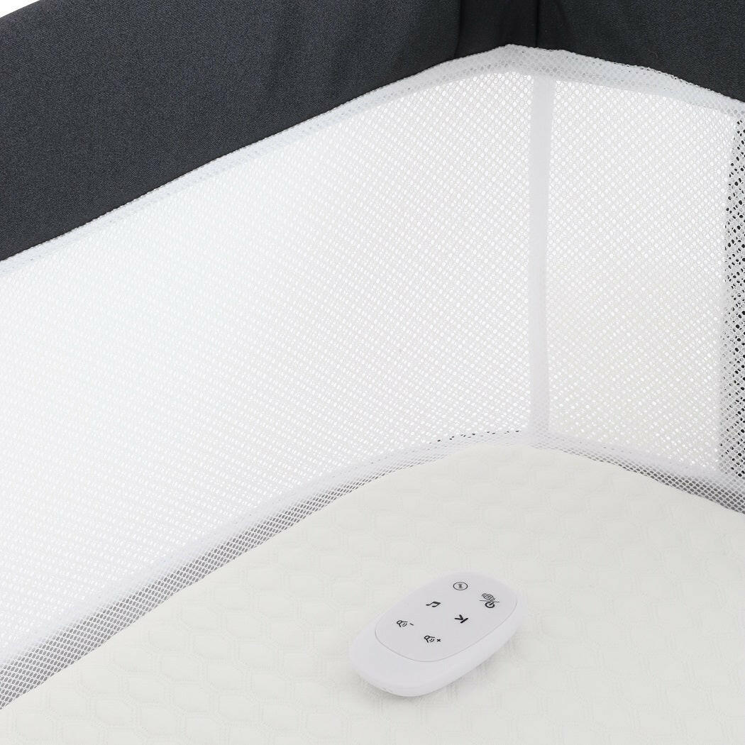 BabyStyle Oyster Wiggle Co-Sleeper Bedside Crib - Carbonite - interior with remote control