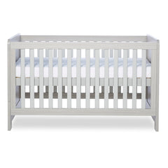 Ickle Bubba Pembrey Cot Bed - Ash Grey - side view, with mattress base at highest level