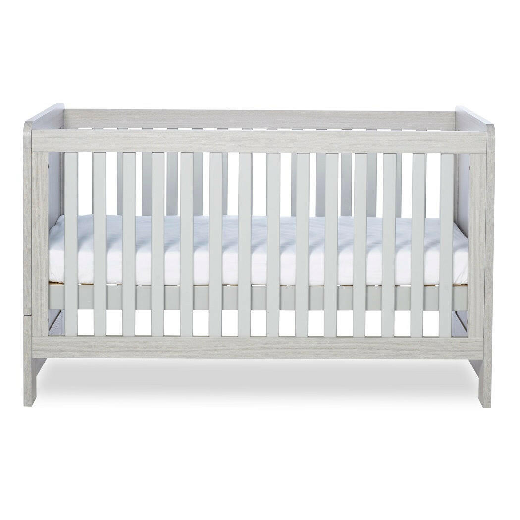 Ickle Bubba Pembrey Cot Bed - Ash Grey - side view, with mattress base at middle level