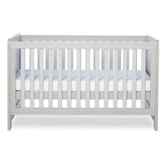 Ickle Bubba Pembrey Cot Bed - Ash Grey - side view, with mattress base at middle level