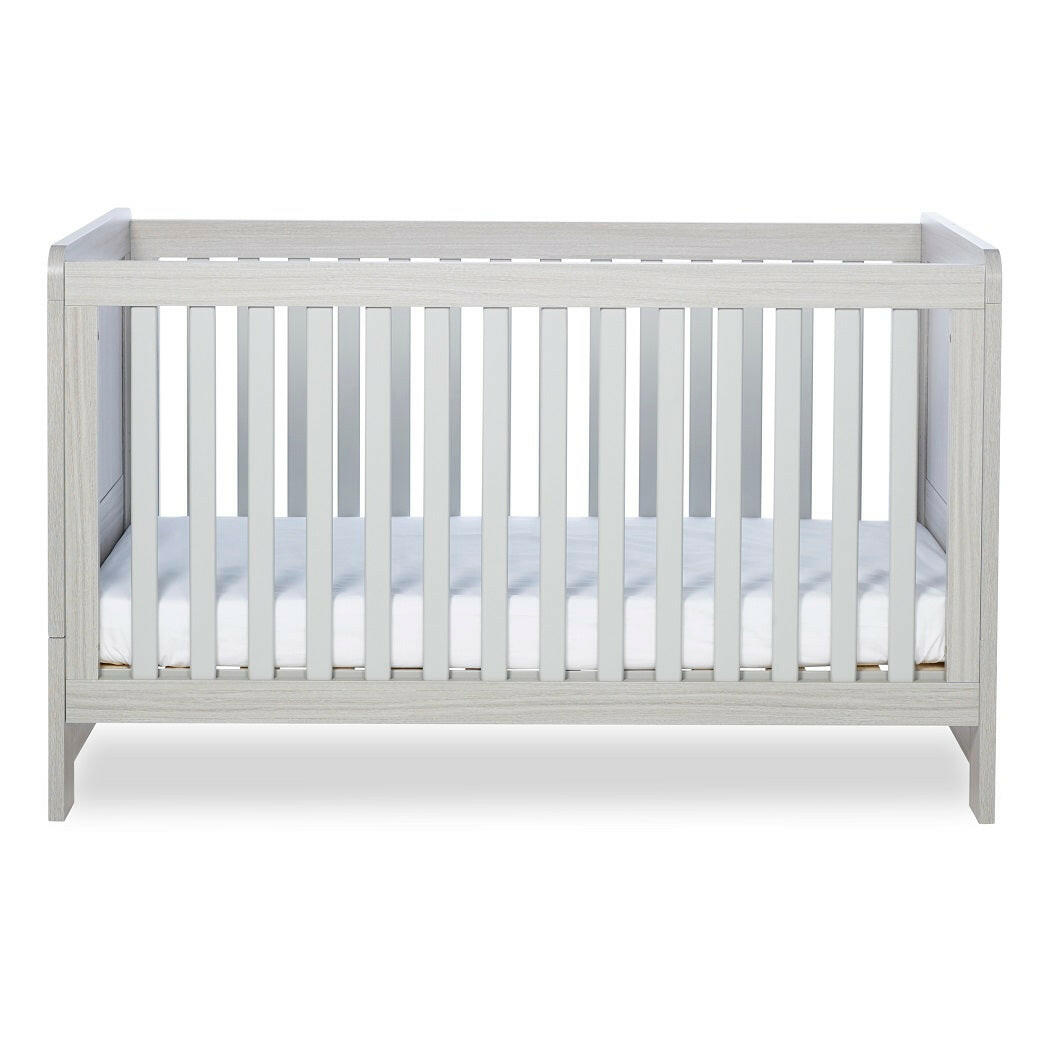 Ickle Bubba Pembrey Cot Bed - Ash Grey - side view, with mattress base at lowest level
