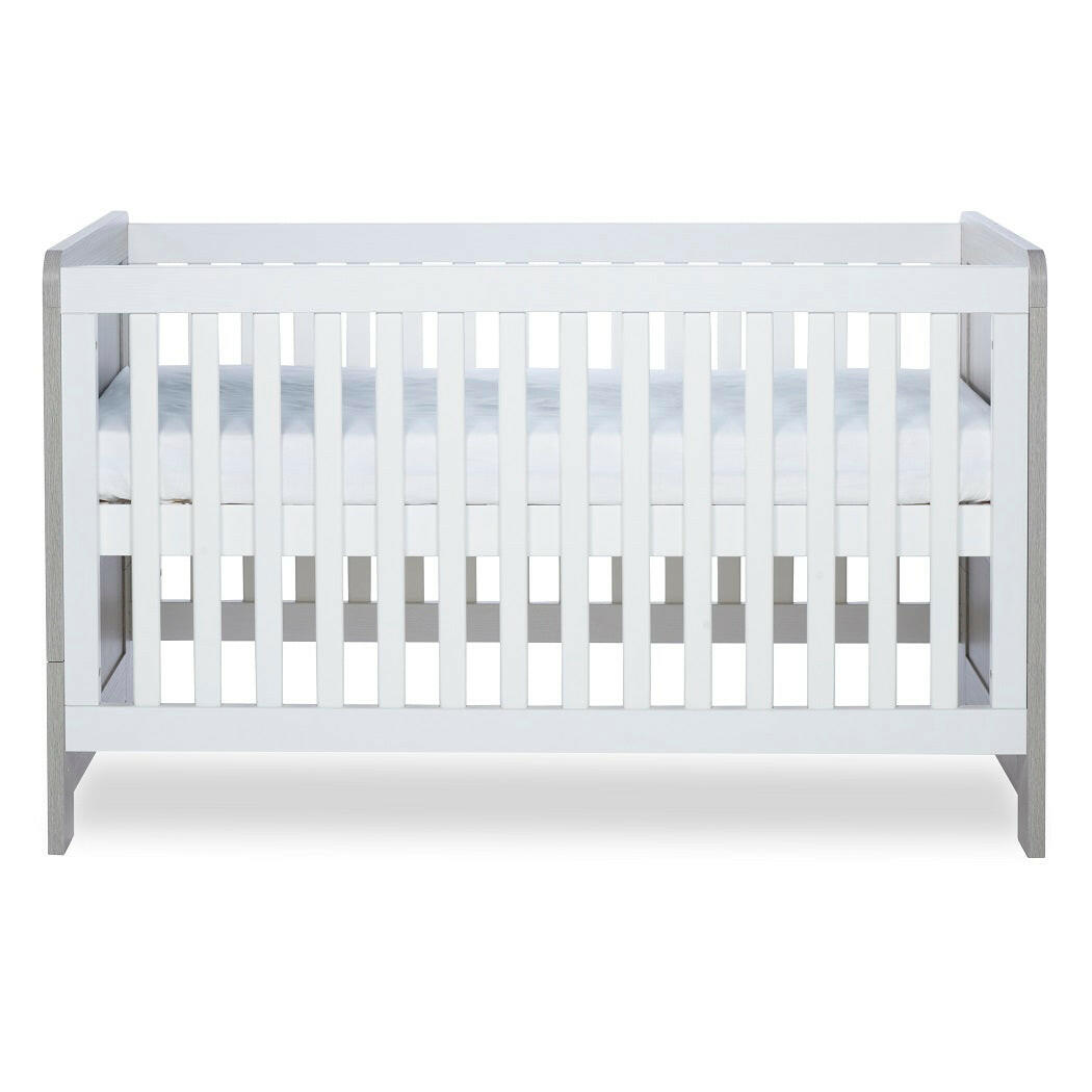 Ickle Bubba Pembrey Cot Bed - Ash Grey & White - side view, with mattress base at highest level