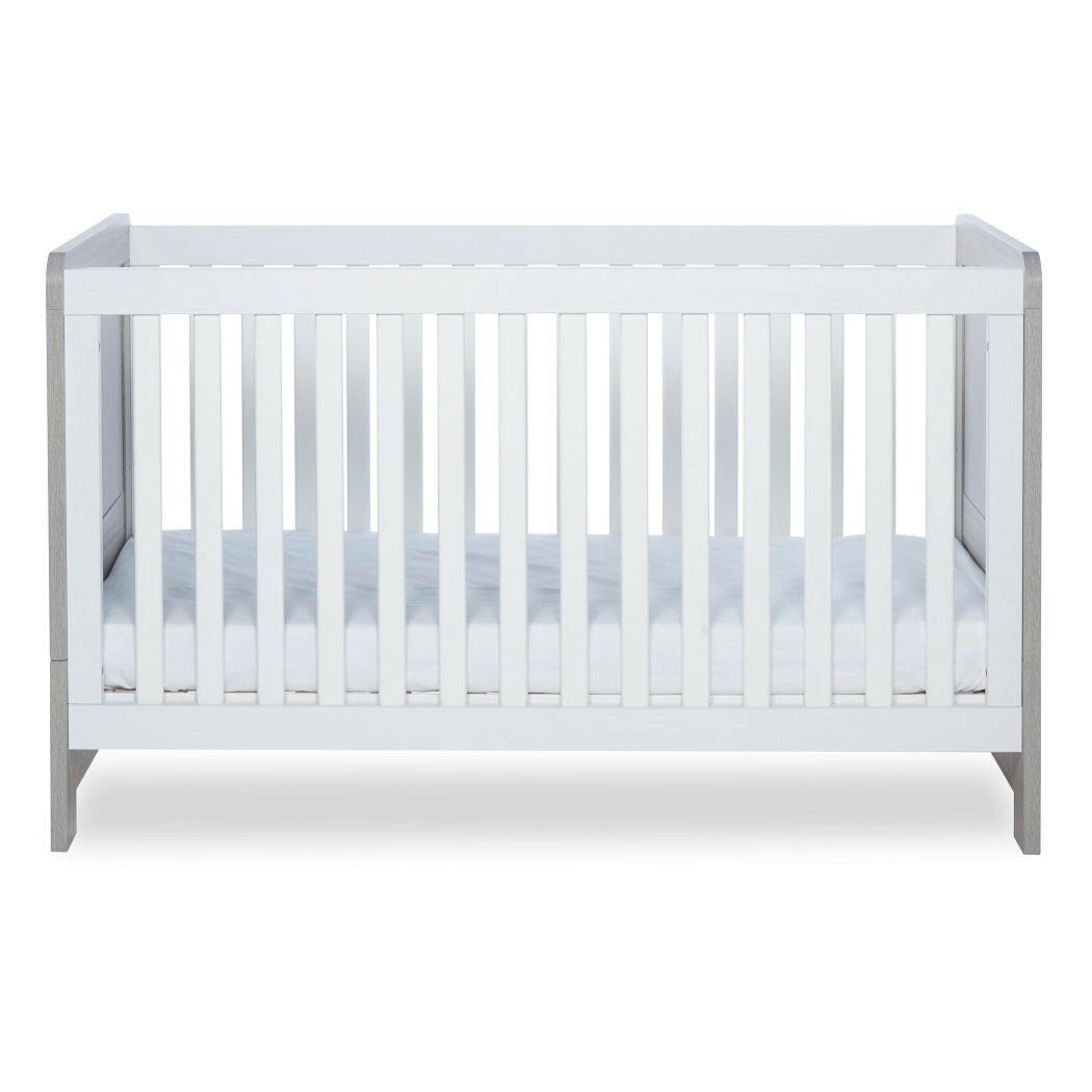 Ickle Bubba Pembrey Cot Bed - Ash Grey & White - side view, with mattress base at lowest level