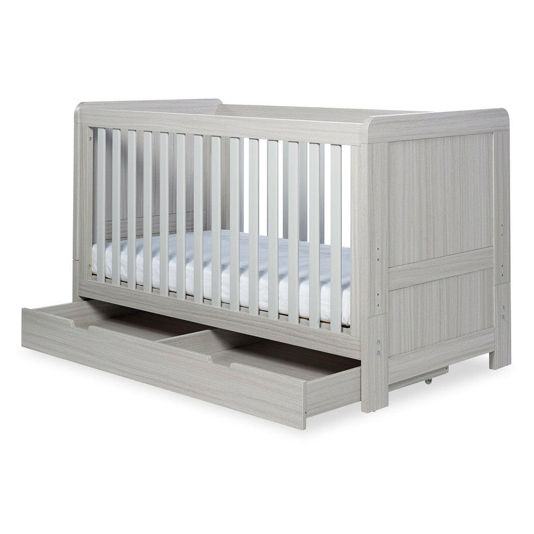 Ickle Bubba Pembrey Cot Bed & Drawer - Ash Grey - quarter view, with under drawer pulled out