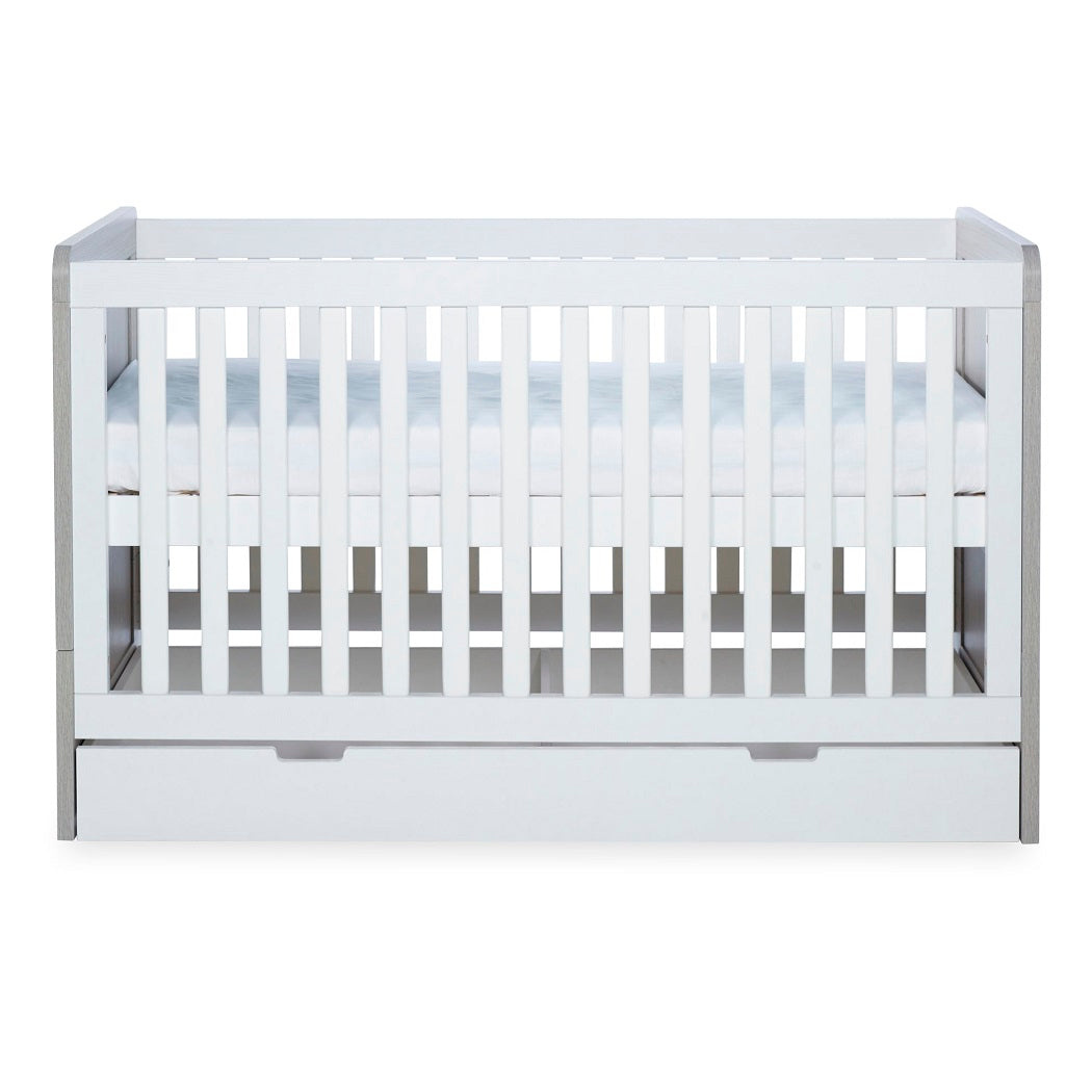 Ickle Bubba Pembrey Cot Bed & Under Drawer - Ash Grey White - with mattress base at its highest level