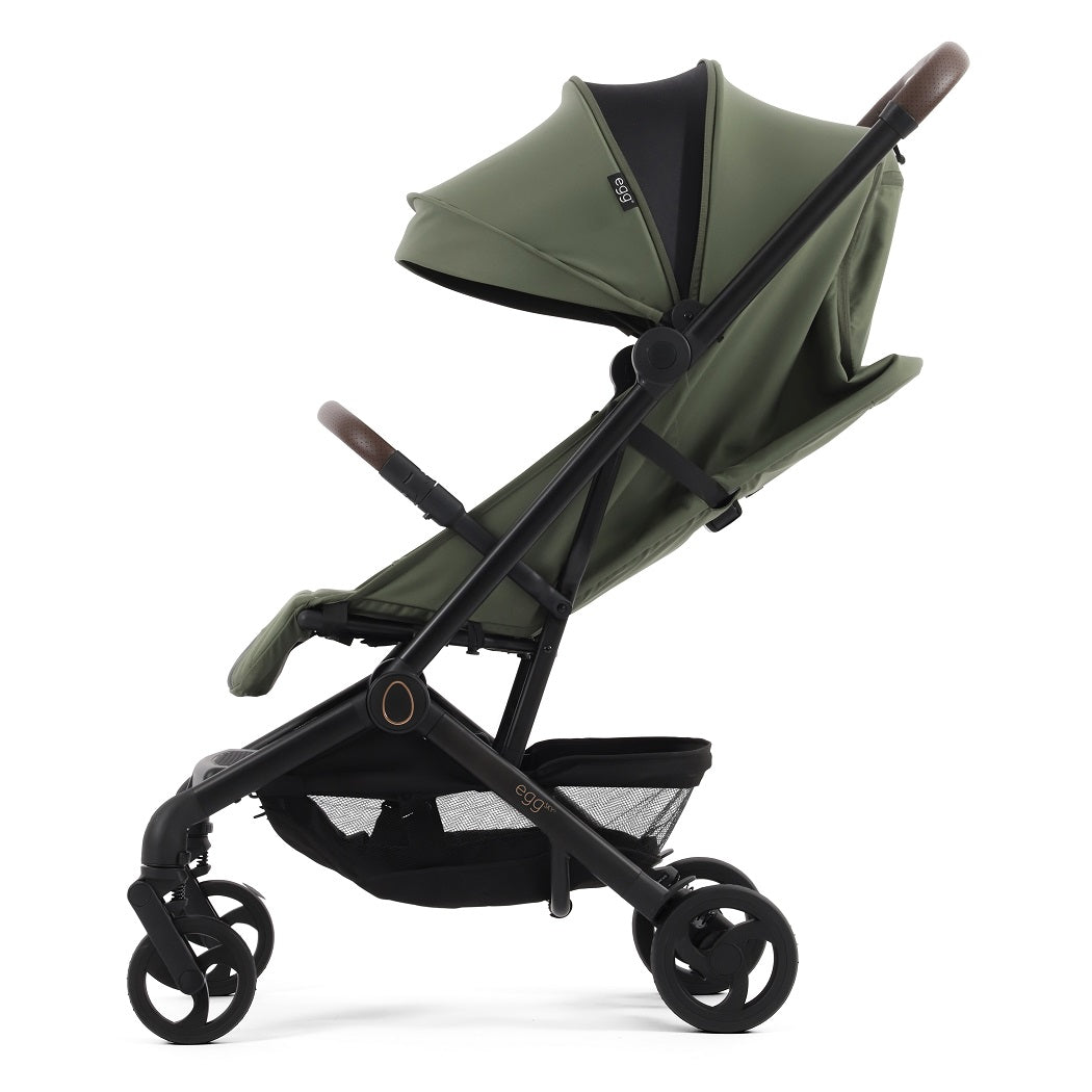 egg Sky Cabin Approved Travel Stroller - Green - side view with seat reclined