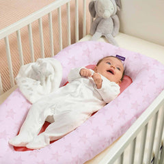 Clevamama ClevaSleep POD (Pink Stars) - lifestyle image, showing the pod being used inside a cot