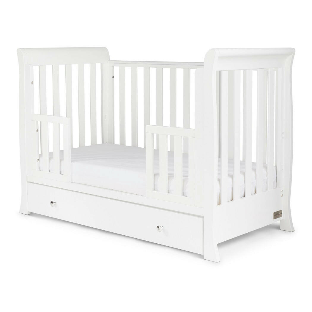 Ickle Bubba Snowdon MINI 4-in-1 Cot Bed & Drawer - White - quarter view, junior bed with protective mini side rails