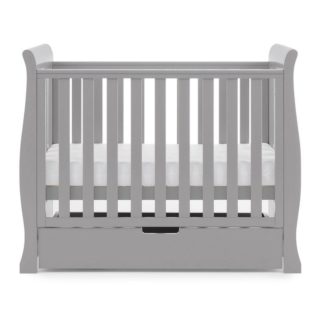 Obaby Stamford Space Saver Cot (Warm Grey) - side view, shown with mattress base at middle level (mattress not included, available separately)