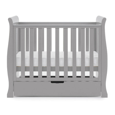 Obaby Stamford Space Saver Cot (Warm Grey) - side view, shown with mattress base at middle level (mattress not included, available separately)
