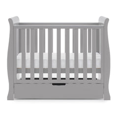 Obaby Stamford Space Saver Cot (Warm Grey) - side view, shown with mattress base at middle level (mattress not included, available separately)