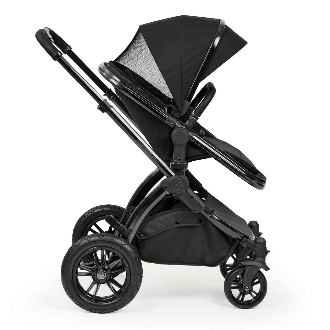 Ickle Bubba Stomp Luxe Elements Pushchair - Raven - side view, forward-facing with ventilated hood panel