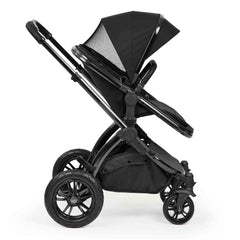 Ickle Bubba Stomp Luxe Elements Pushchair - Raven - side view, forward-facing with ventilated hood panel