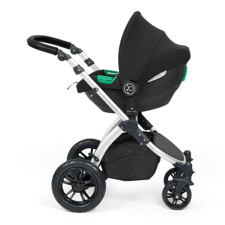 Ickle Bubba Stomp LUXE Travel System with Cirrus Car Seat & ISOFIX Base - Siver/Charcoal/Black - showing the Cirrus i-Size Car Seat fixed to the pushchair`s chassis