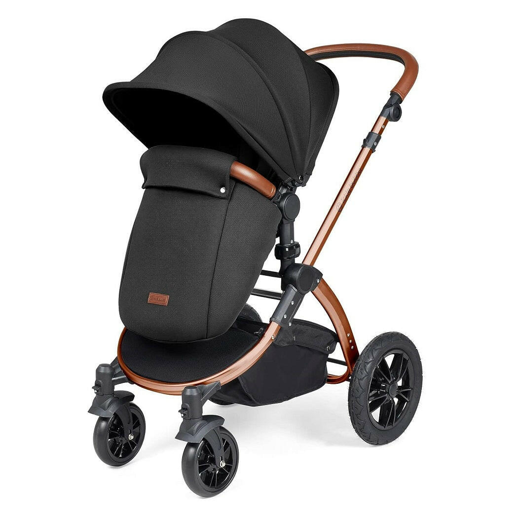 Ickle Bubba Stomp LUXE Travel System - Bronze/Midnight/Tan - showing the pushchair in forward-facing mode with the included footmuff