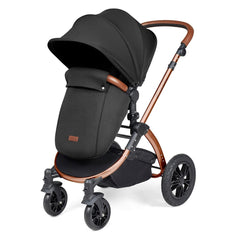 Ickle Bubba Stomp LUXE Travel System with Stratus Car Seat & ISOFIX Base (Bronze/Midnight/Tan) - showing the pushchair in forward-facing mode with the included footmuff
