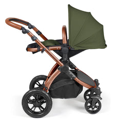 Ickle Bubba Stomp LUXE Travel System with Stratus Car Seat & ISOFIX Base (Bronze/Woodland/Tan) - showing the seat unit and chassis together as the pushchair in parent-facing mode with the seat reclined