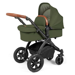 Ickle Bubba Stomp LUXE Travel System with Stratus Car Seat & ISOFIX Base (Black/Woodland/Tan) - showing the carrycot and chassis together as the pram
