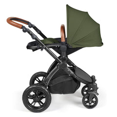 Ickle Bubba Stomp LUXE Travel System with Stratus Car Seat & ISOFIX Base (Black/Woodland/Tan) - showing the seat unit and chassis together as the pushchair in parent-facing mode with the seat reclined