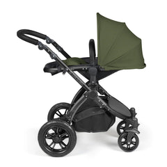 Ickle Bubba Stomp LUXE Travel System with Stratus Car Seat & ISOFIX Base (Black/Woodland/Black) - showing the seat unit and chassis together as the pushchair in parent-facing mode with the seat reclined