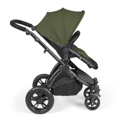 Ickle Bubba Stomp LUXE Travel System - Black/Woodland/Black - showing the pushchair in forward-facing mode