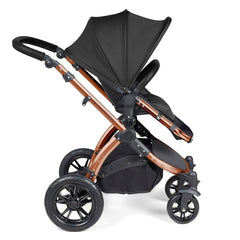 Ickle Bubba Stomp LUXE Travel System - Bronze/Midnight/Black - side view, showing the forward-facing pushchair