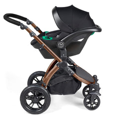 Ickle Bubba Stomp LUXE Travel System with Stratus Car Seat & ISOFIX Base (Bronze/Midnight/Black) - showing the included Ickle Bubba Stratus i-Size Car Seat fixed to the pushchair`s chassis using the included adaptors