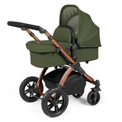 Ickle Bubba Stomp LUXE Travel System with Stratus Car Seat & ISOFIX Base (Bronze/Woodland/Black) - showing the carrycot and chassis together as the pram