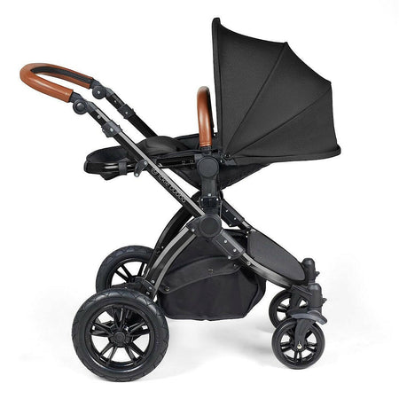 Ickle Bubba Stomp LUXE Travel System - Black/Midnight/Tan - showing the seat unit and chassis together as the pushchair in parent-facing mode with the seat reclined