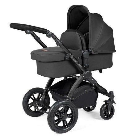Ickle Bubba Stomp LUXE Travel System with Cirrus Car Seat & ISOFIX Base - Black/Charcoal/Black - showing the pram