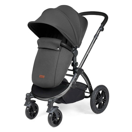 Ickle Bubba Stomp LUXE Travel System with Cirrus Car Seat & ISOFIX Base - Black/Charcoal/Black - showing the pushchair in forward-facing mode with the included footmuff