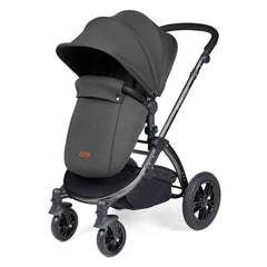 Ickle Bubba Stomp LUXE Travel System with Stratus Car Seat & ISOFIX Base (Black/Charcoal/Black) - showing the pushchair in forward-facing mode with the included footmuff