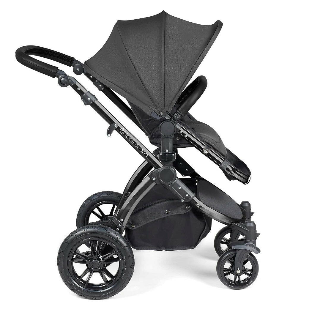 Ickle Bubba Stomp LUXE Travel System with Cirrus Car Seat & ISOFIX Base - Black/Charcoal/Black - side view, showing the forward-facing pushchair