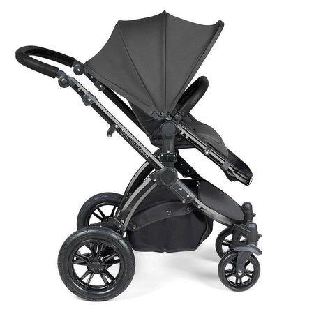 Ickle Bubba Stomp LUXE Travel System with Cirrus Car Seat & ISOFIX Base - Black/Charcoal/Black - side view, showing the forward-facing pushchair
