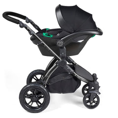 Ickle Bubba Stomp LUXE Travel System with Stratus Car Seat & ISOFIX Base (Black/Charcoal/Black) - showing the included Ickle Bubba Stratus i-Size Car Seat fixed to the pushchair`s chassis using the included adaptors