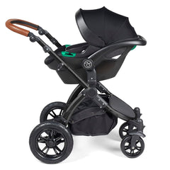 Ickle Bubba Stomp LUXE Travel System with Stratus Car Seat & ISOFIX Base (Black/Charcoal/Tan) - showing the included Ickle Bubba Stratus i-Size Car Seat fixed to the pushchair`s chassis using the included adaptors