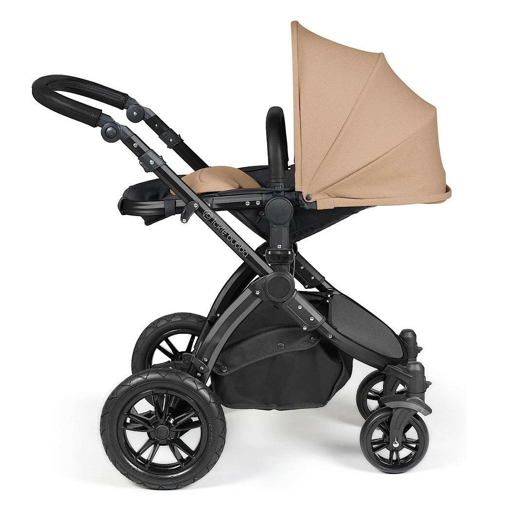 Ickle Bubba Stomp LUXE Travel System with Cirrus Car Seat & ISOFIX Base - Black/Desert/Black - showing the seat unit and chassis together as the pushchair in parent-facing mode with the seat reclined