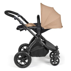 Ickle Bubba Stomp LUXE Travel System with Stratus Car Seat & ISOFIX Base (Black/Desert/Black) - showing the seat unit and chassis together as the pushchair in parent-facing mode with the seat reclined