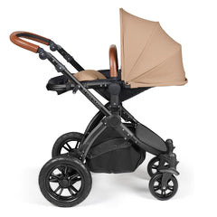 Ickle Bubba Stomp LUXE Travel System with Stratus Car Seat & ISOFIX Base (Black/Desert/Tan) - showing the seat unit and chassis together as the pushchair in parent-facing mode with the seat reclined