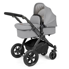 Ickle Bubba Stomp LUXE Travel System with Stratus Car Seat & ISOFIX Base (Black/Pearl Grey/Black) - showing the carrycot and chassis together as the pram