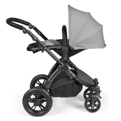 Ickle Bubba Stomp LUXE Travel System with Stratus Car Seat & ISOFIX Base (Black/Pearl Grey/Black) - showing the seat unit and chassis together as the pushchair in parent-facing mode with the seat reclined