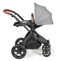 Ickle Bubba Stomp LUXE Travel System - Black/Pearl Grey/Tan - showing the seat unit and chassis together as the pushchair in parent-facing mode with the seat reclined