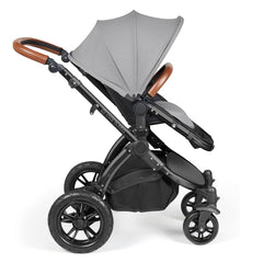 Ickle Bubba Stomp LUXE Travel System with Stratus Car Seat & ISOFIX Base (Black/Pearl Grey/Tan) - side view, showing the forward-facing pushchair
