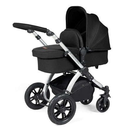 Ickle Bubba Stomp LUXE Travel System - Silver/Midnight/Black - showing the carrycot and chassis together as the pram