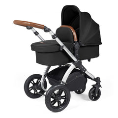 Ickle Bubba Stomp LUXE Travel System with Stratus Car Seat & ISOFIX Base (Silver/Midnight/Tan) - showing the carrycot and chassis together as the pram