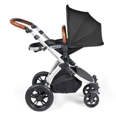 Ickle Bubba Stomp LUXE Travel System with Stratus Car Seat & ISOFIX Base (Silver/Midnight/Tan) - showing the seat unit and chassis together as the pushchair in parent-facing mode with the seat reclined