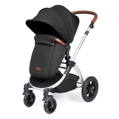 Ickle Bubba Stomp LUXE Travel System with Stratus Car Seat & ISOFIX Base (Silver/Midnight/Tan) - showing the pushchair in forward-facing mode with the included footmuff