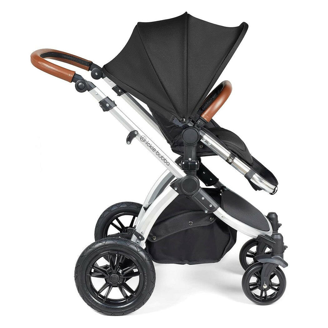 Ickle Bubba Stomp LUXE Travel System - Silver/Midnight/Tan - side view, showing the forward-facing pushchair with its seat upright