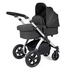 Ickle Bubba Stomp LUXE Travel System with Stratus Car Seat & ISOFIX Base (Silver/Charcoal/Black) - showing the carrycot and chassis together as the pram
