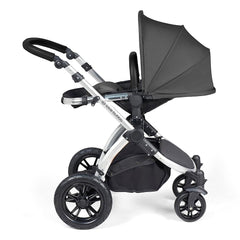 Ickle Bubba Stomp LUXE Travel System with Stratus Car Seat & ISOFIX Base (Silver/Charcoal/Black) - showing the seat unit and chassis together as the pushchair in parent-facing mode with the seat reclined